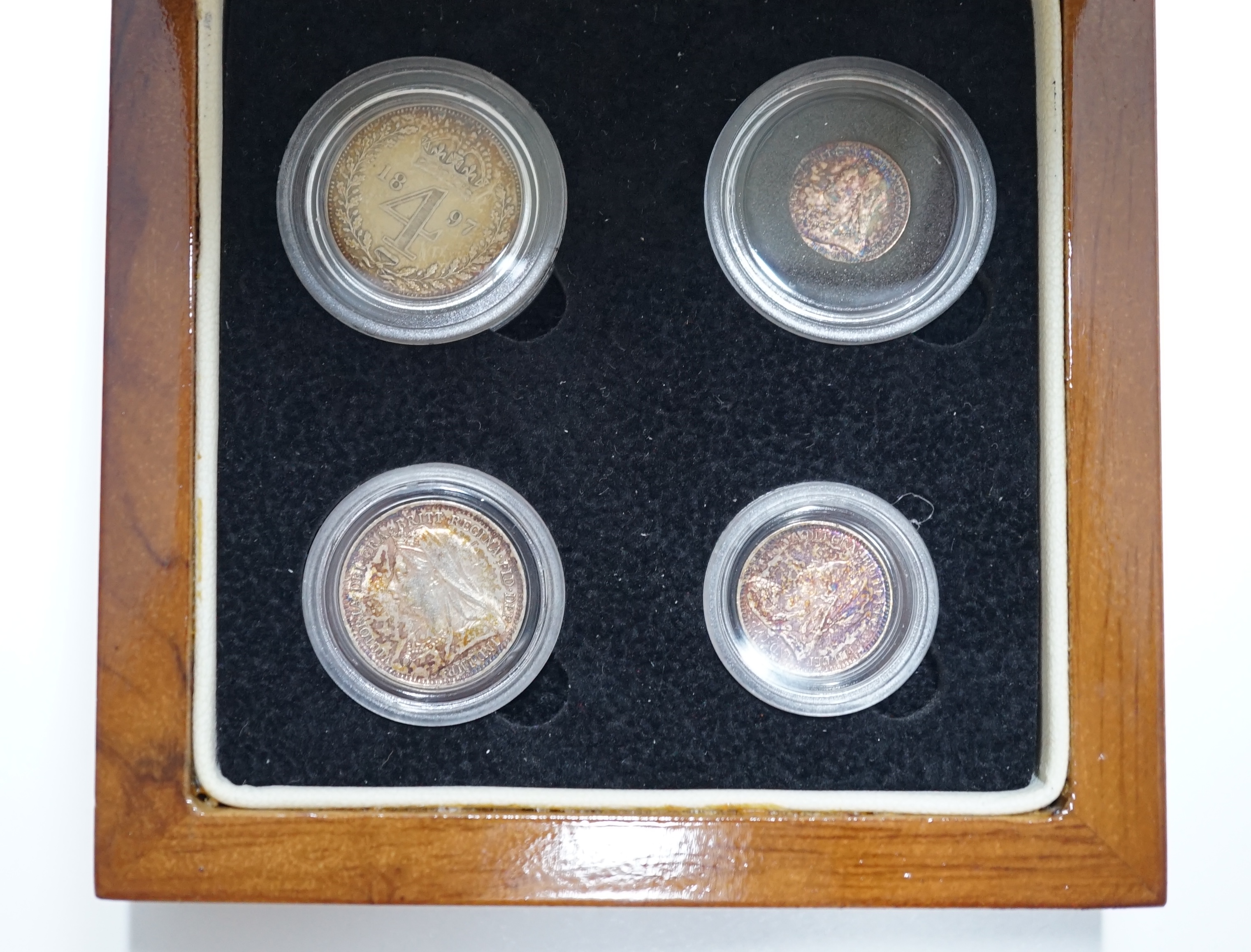 British silver coins, Victoria Veiled portrait four coin set of Maundy coins, 1897, toned UNC, in London Mint case